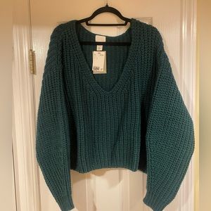 Green cropped sweater